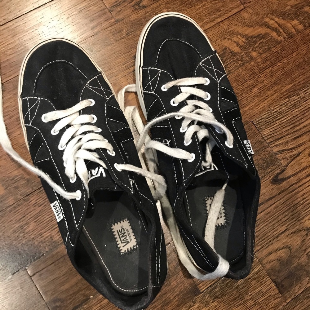 Black Vans sneakers